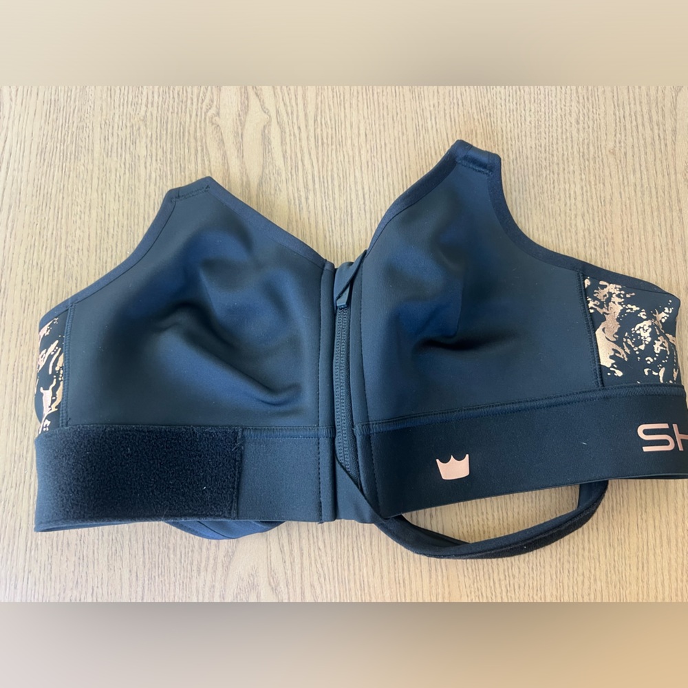 SHEFIT Black Sports Bra with Blush Accents